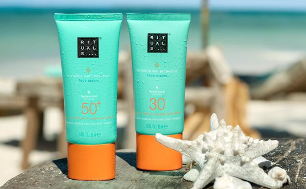 Tubes of The Ritual of Karma sunscreen face cream in SPF 50 and SPF 30.