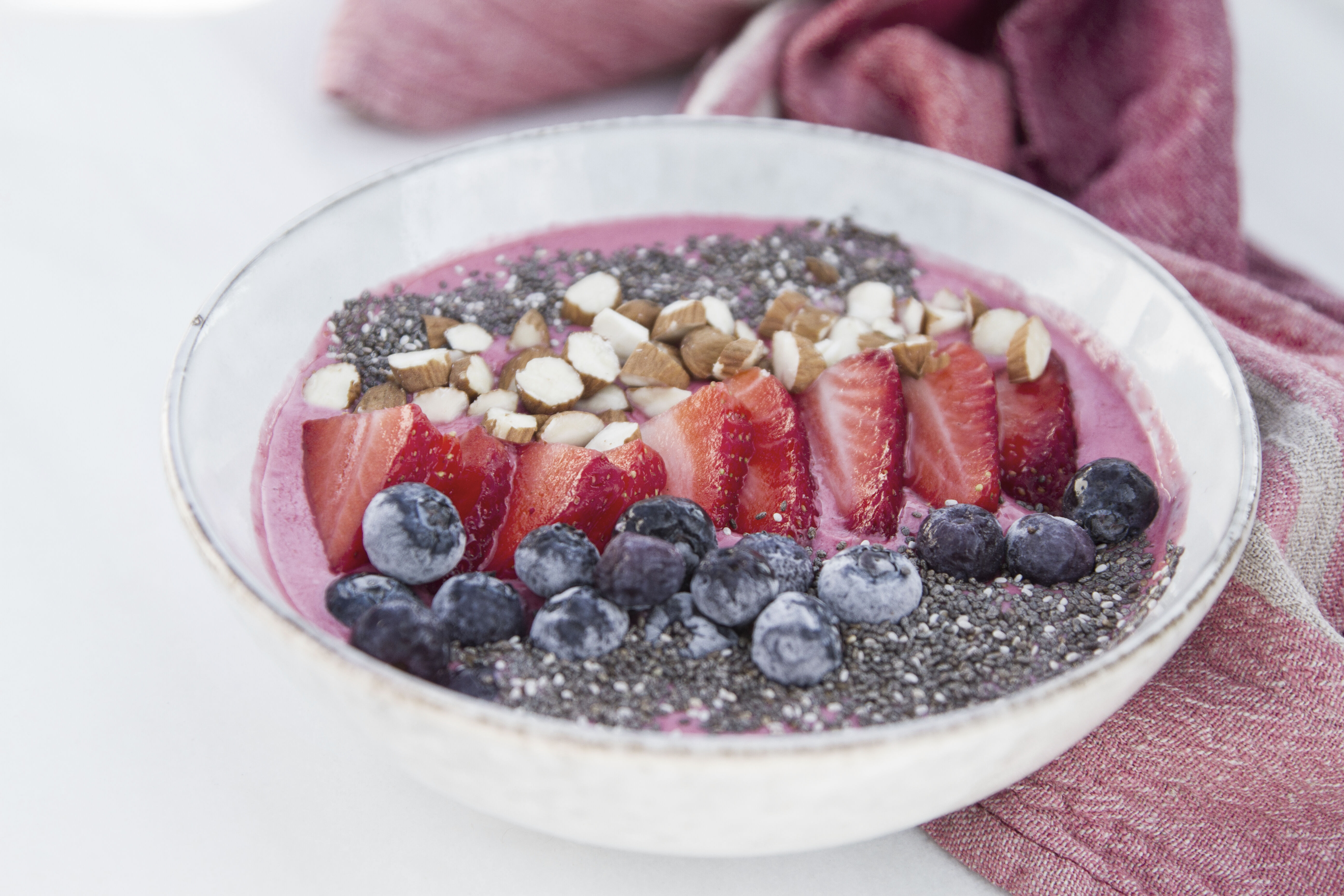 Raspberry smoothie bowl with chia seeds