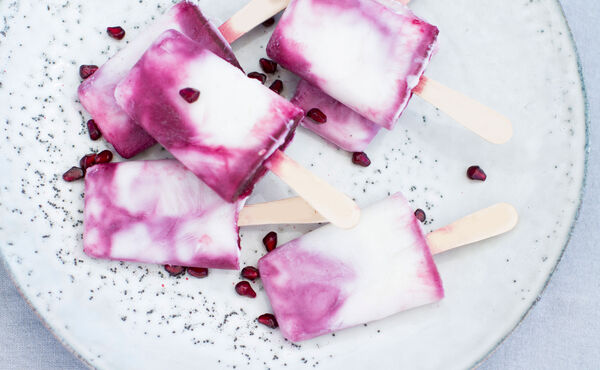 Coconut yoghurt popsicles with pomegranate