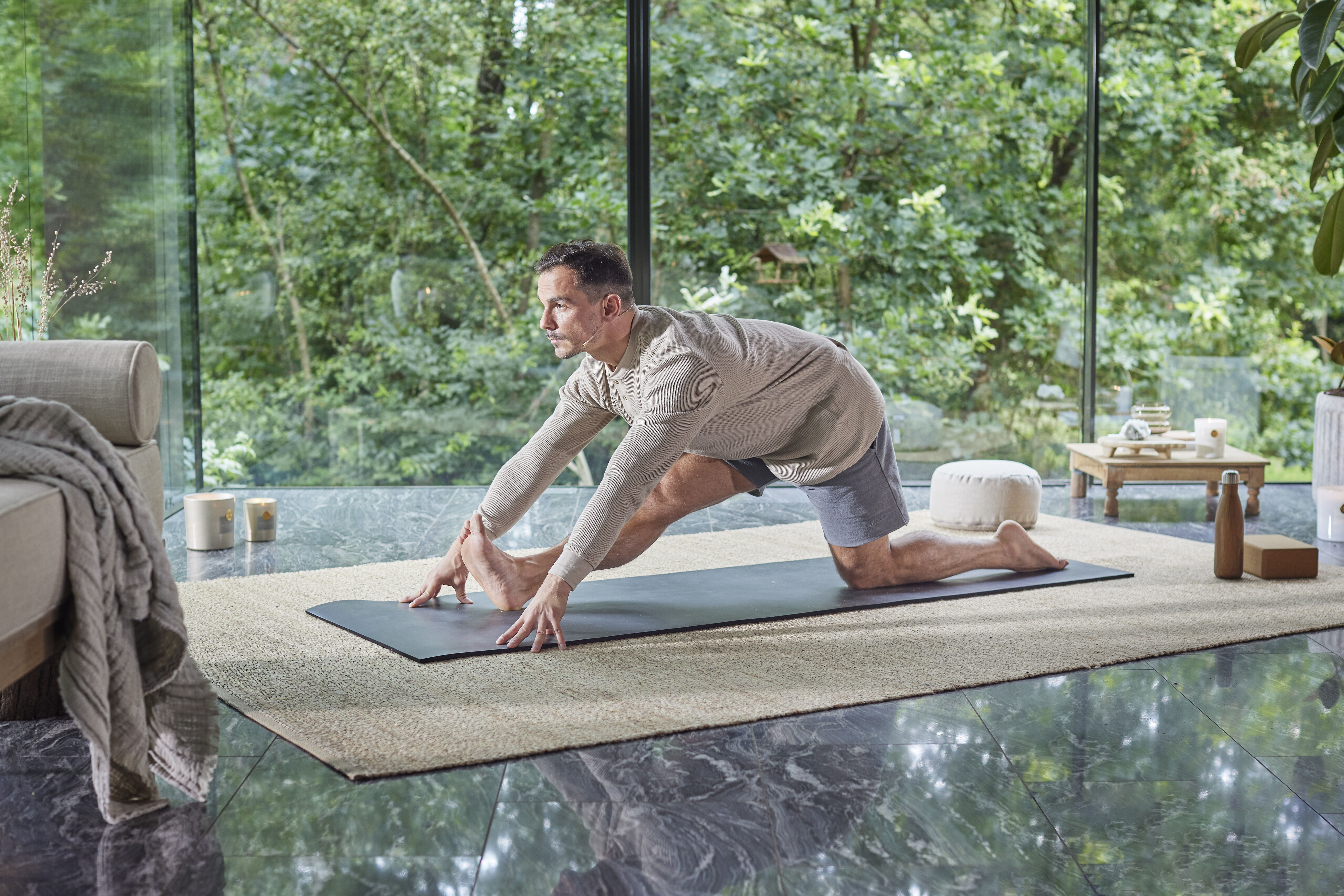 Feeling stiff in the morning? This 15-minute joyful yoga flow will loosen you up