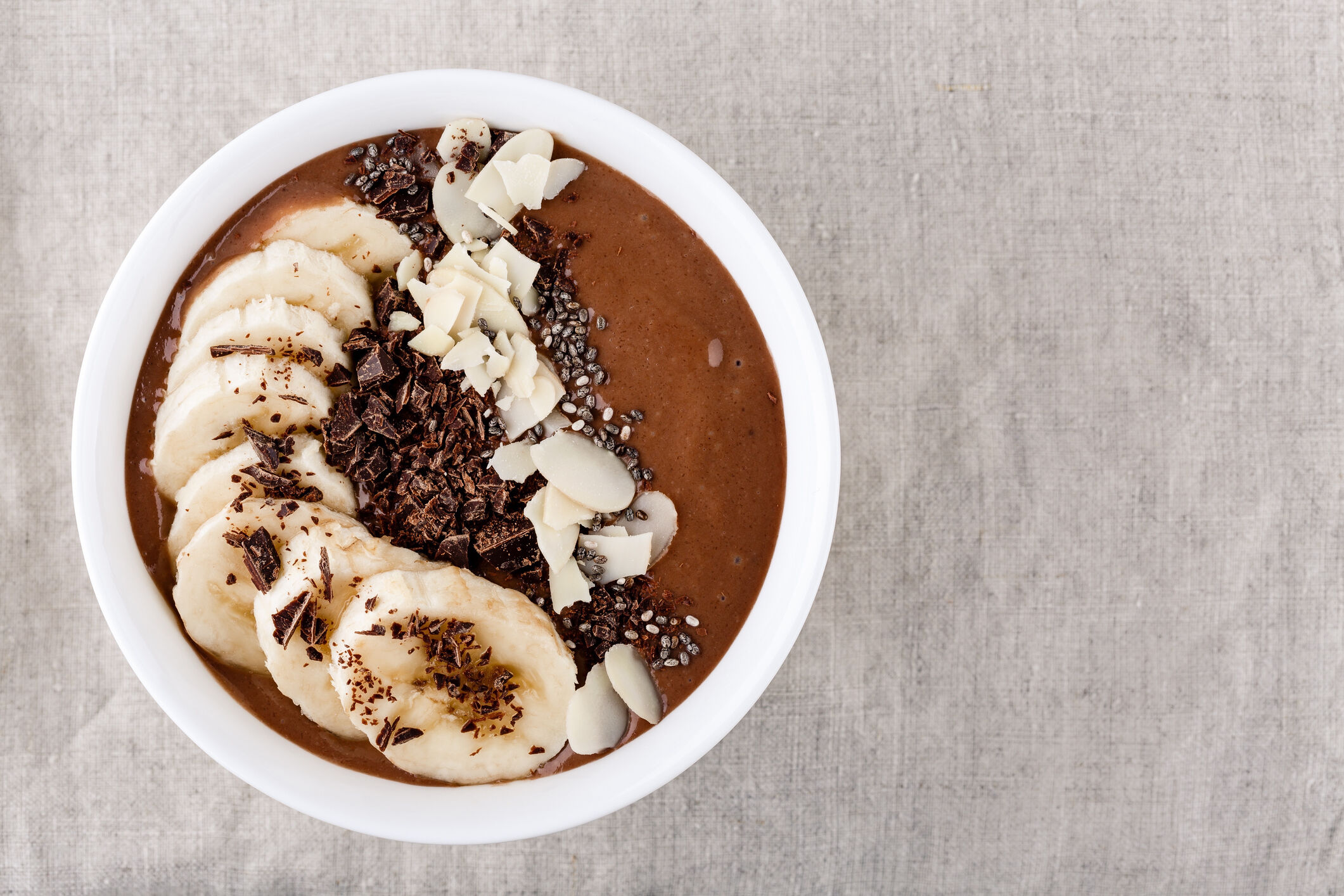 Banana chocolate smoothie bowl with peanut butter